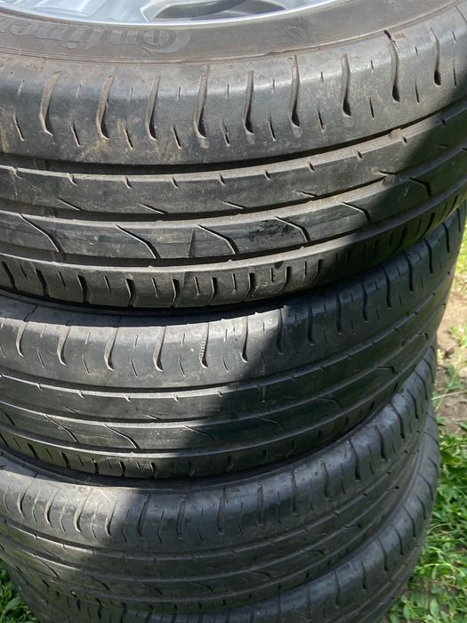 Alufelgi orginalne Ford 15-4x108 z oponami letnimi continental