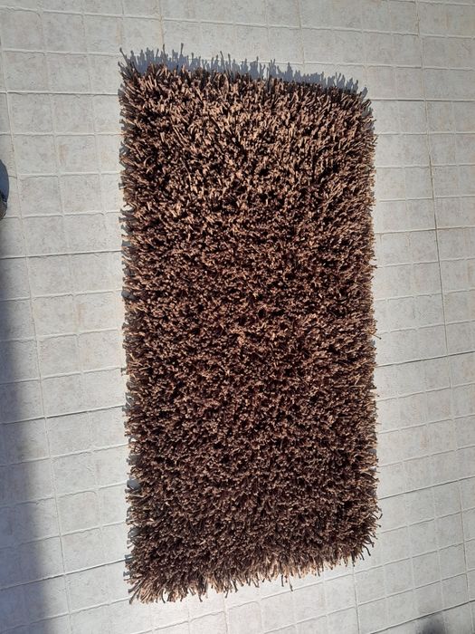 Carpetes e tapetes de fios altos