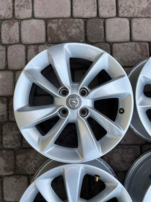 Oryginalne alufelgi Opel 4x100 15 cali Czujniki Corsa Adam Karl