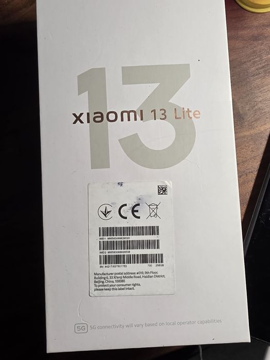Xiaomi 13 lite usado com marcas de uso