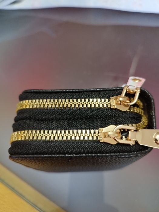 Carteira muito bonita e prática