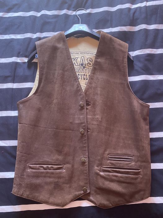 Colete de homem em pele