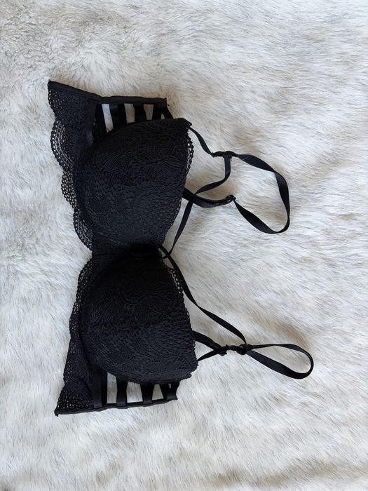 Czarny gorsetowy stanik damski z ozdobnymi paskami 75C