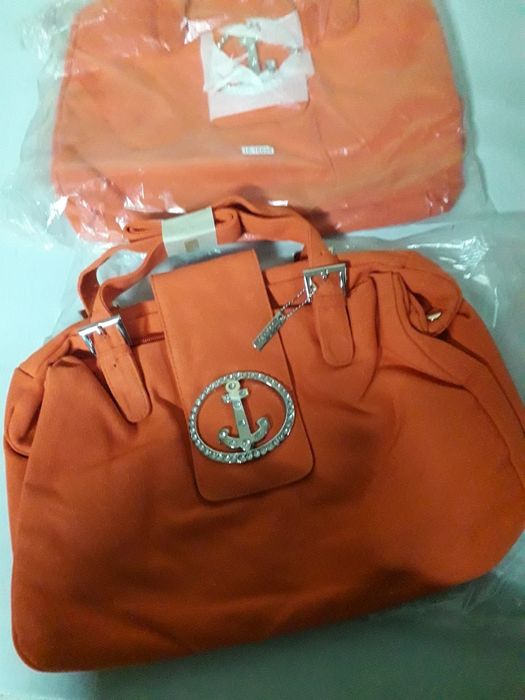 Duas bolsas novas originais segredos de beleza (Ler anuncio)