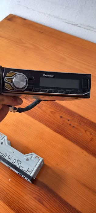 Auto radio Pioneer com gaveta fichas e aro preto