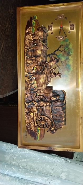 Relógio em formato de quadro