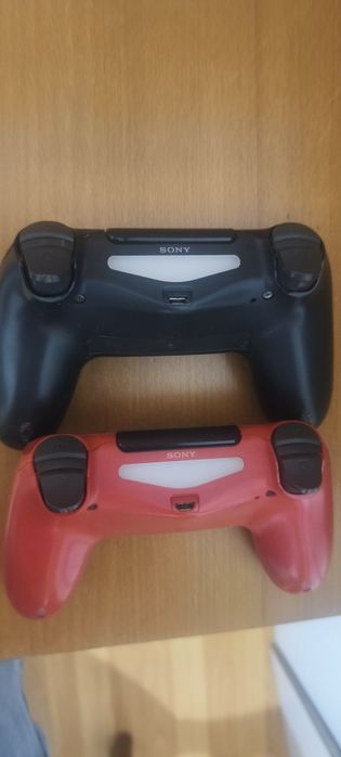 2 comandos PlayStation...p/ peças