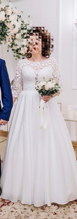 Весільна вишукана сукня