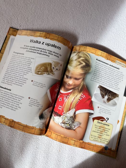 Encyklopedja zwierząt. Psy i szczenięta. Pierwszy Kotek