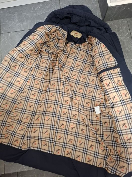 Теплий пуховик 48