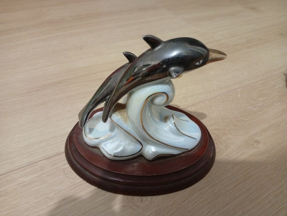 Porcelana golfinhos braco dourado