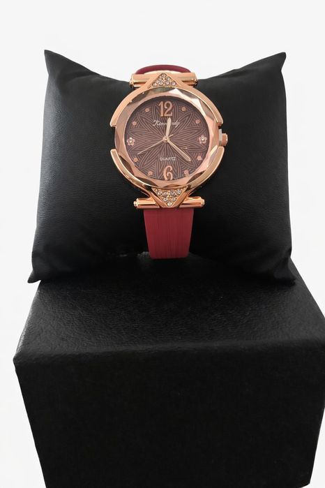 Zegarek damski okrągła złota koperta czarna tarcza cyrkonie pasek