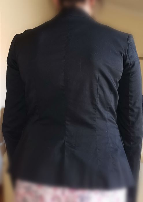 Blazer de mulher preto usado