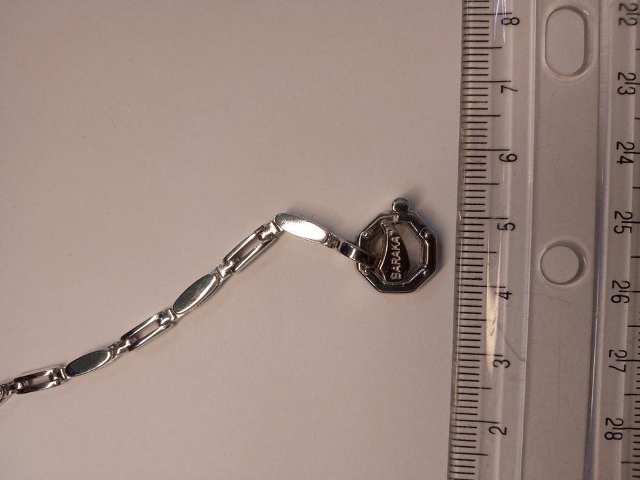 Продам браслет белое золото