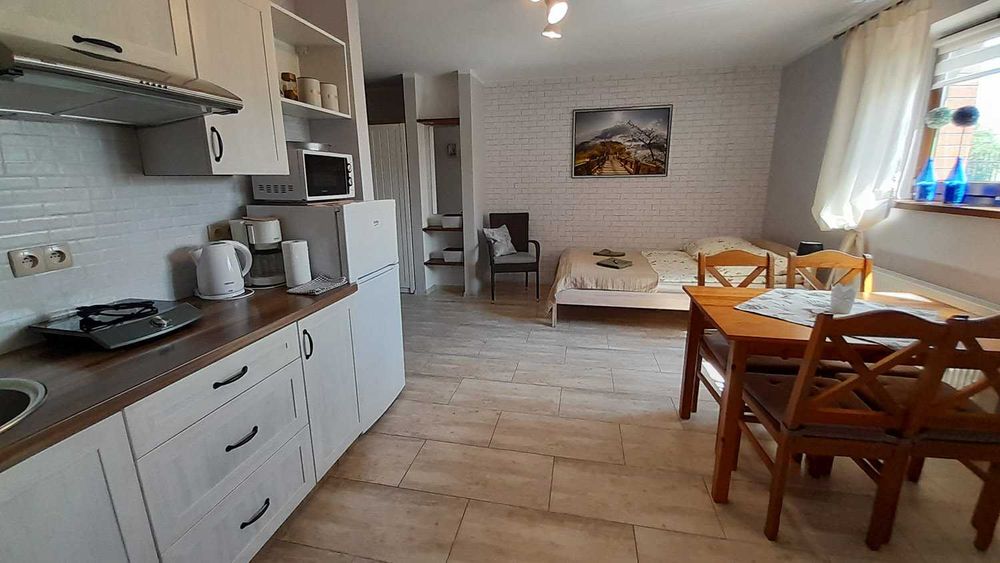 "Słoneczna Ostoja" Pokoje gościnne Apartamenty Mikołajki Mazury