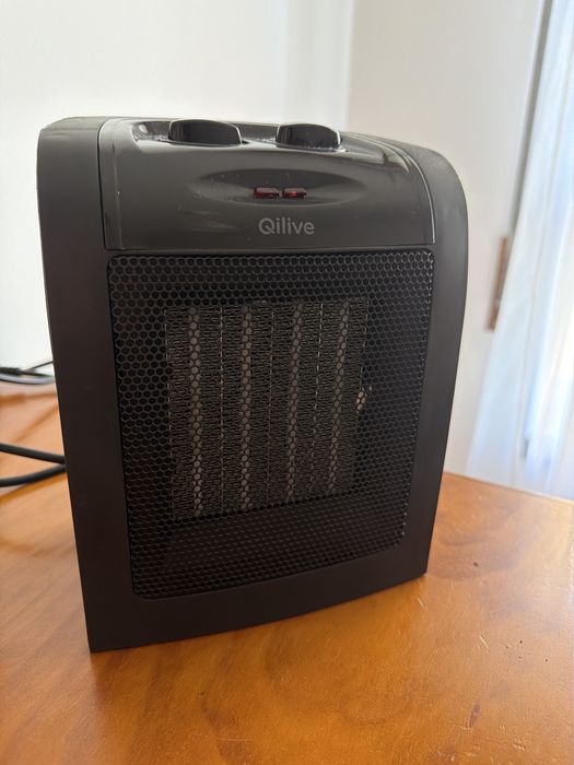 Aquecedor Elétrico Cerâmico Qilive – Compacto e Potente (Como Novo)