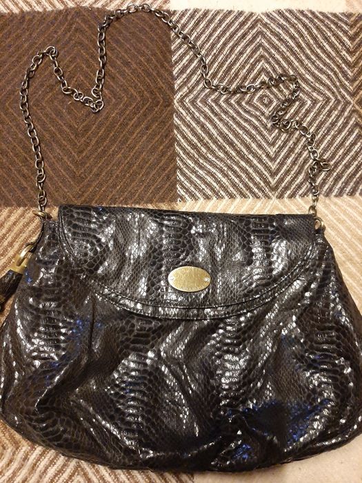 Продам вместительную сумку на цепочке английской фирмы River Island.