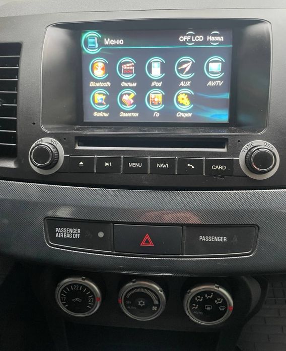 Продам магнитолу Mitsubishi Lancer
