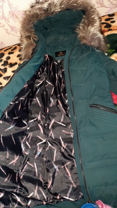 Продам пуховик в гарному стані
