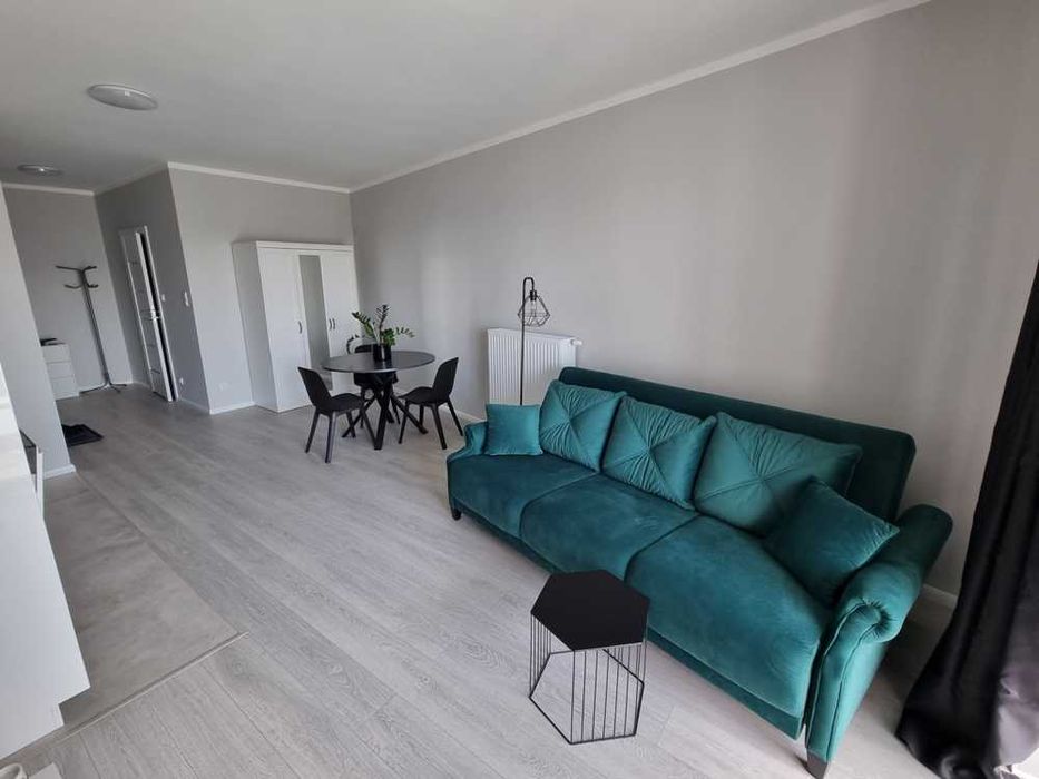 Wynajmę dużą kawalerkę na Ratajach w strzeżonym apartamentowcu ATAL z balkonem i parkingiem