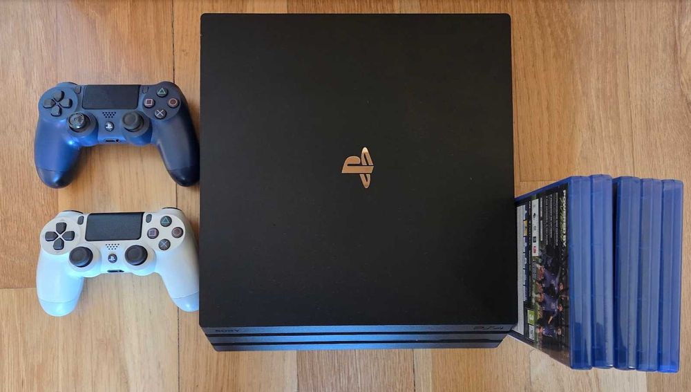 PS4 1TB + 2 comandos + 5 jogos | usada em excelente estado