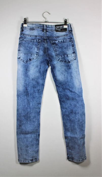 Modne jeansy spodnie dla chlopaka 152 cm wzór Reserved
