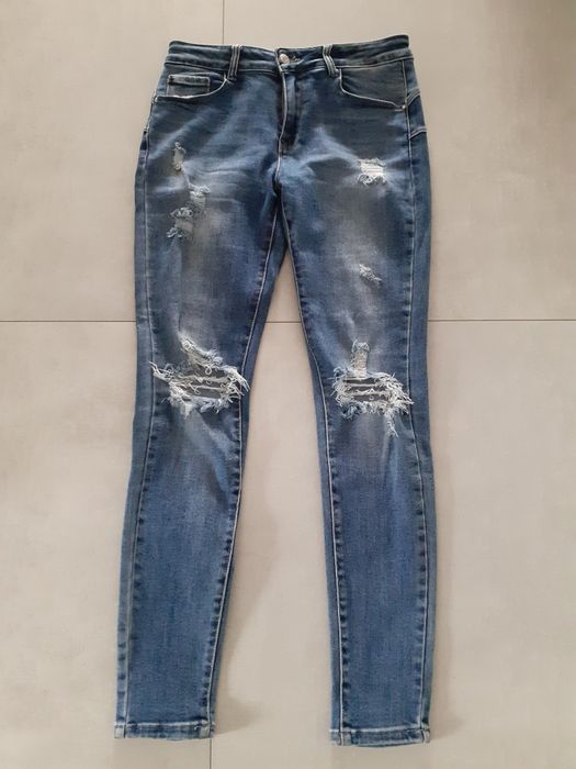 Spodnie damskie jeans z przetarciami