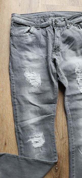 Szare jeansy z przetarciami / spodnie jeansowe vintage / slim fit