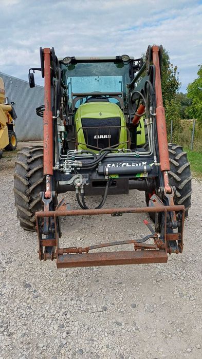 Claas Axos 320 z ładowaczem czołowym Faucheux Captor 100