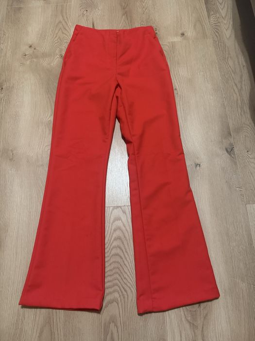 Materialowe spodnie damskie HM typu Flare S