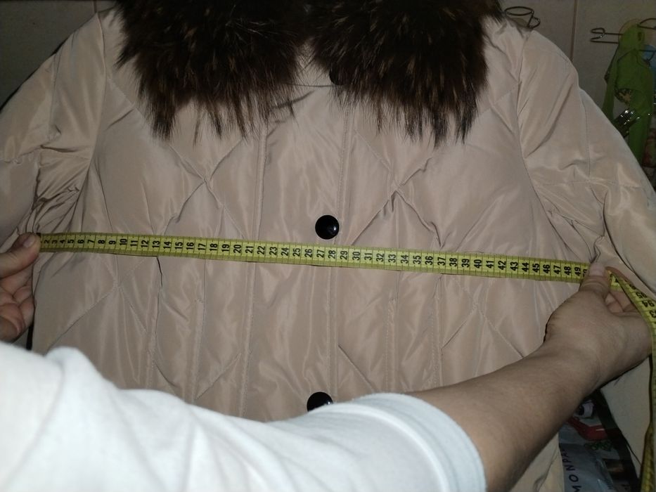 Продаю пуховое пальто.