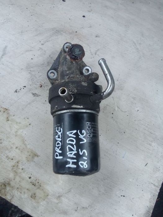 MAZDA 626 probe 2,5 v6  chłodnica oleju podstawa