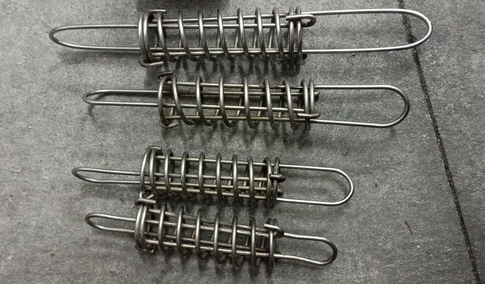 Mola/amortecedor de amarrações