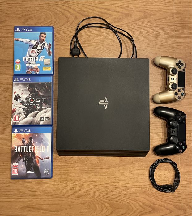 Playstation 4 PRO 1TB + 2pady + 3 gry
