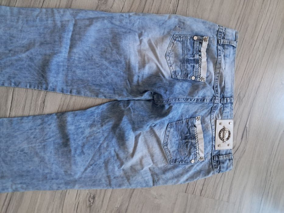 Spodnie jeans z dodatkami damskie