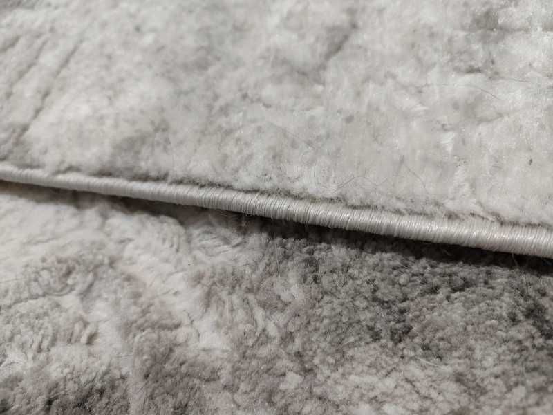 Carpetes cinza e brancas Palmera