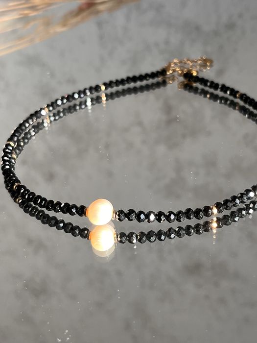 Чокери з чорного оніксу.