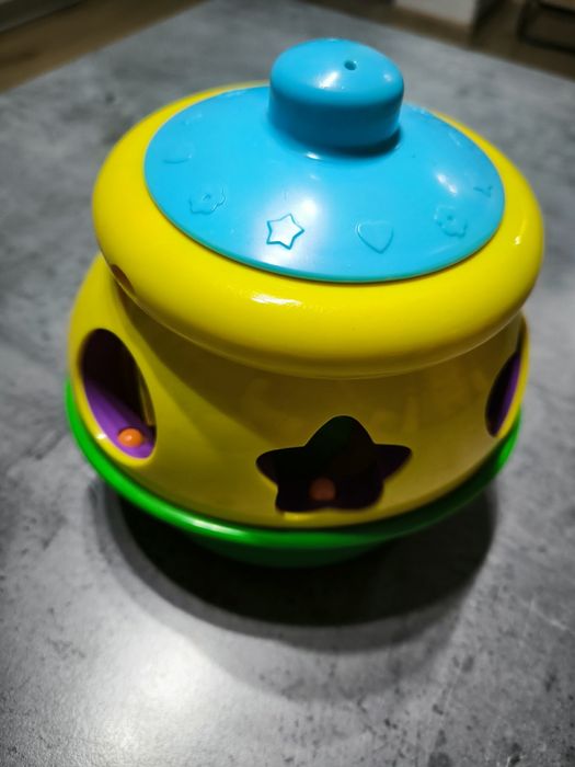 Garnuszek na klocuszek Fisher Price polska weraja