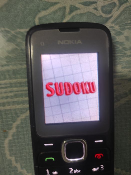 Nokia c1 com jogos /carregador