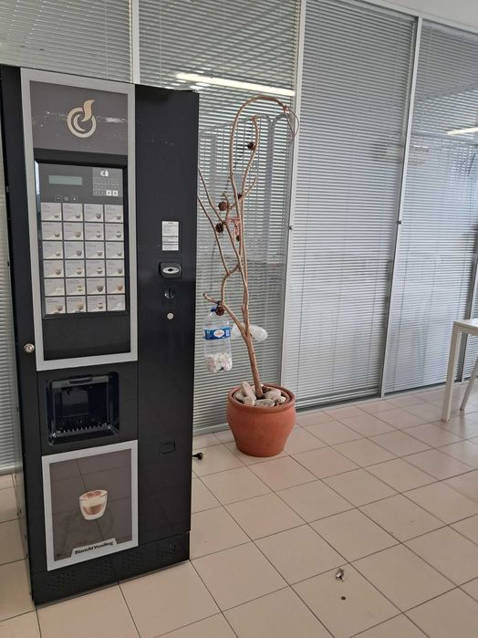 Maquina vending cafe