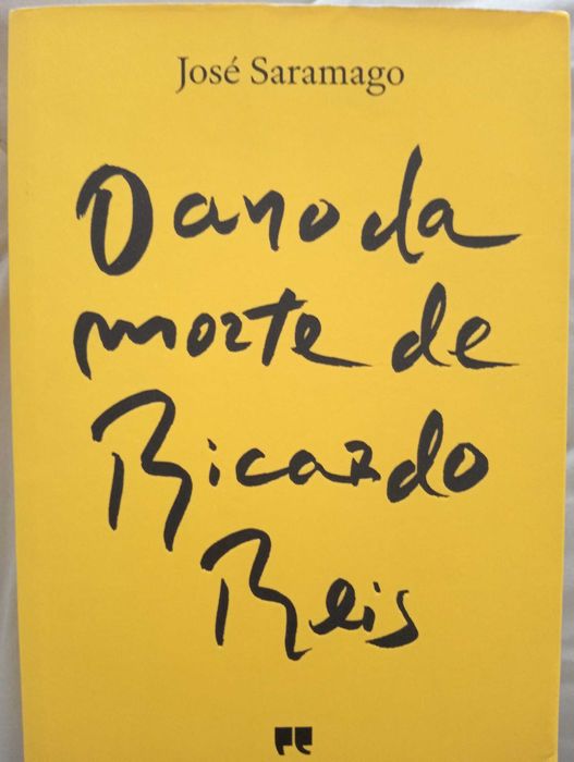 Vendo o livro "O ano da morte de Ricardo Reis" de José Saramago.