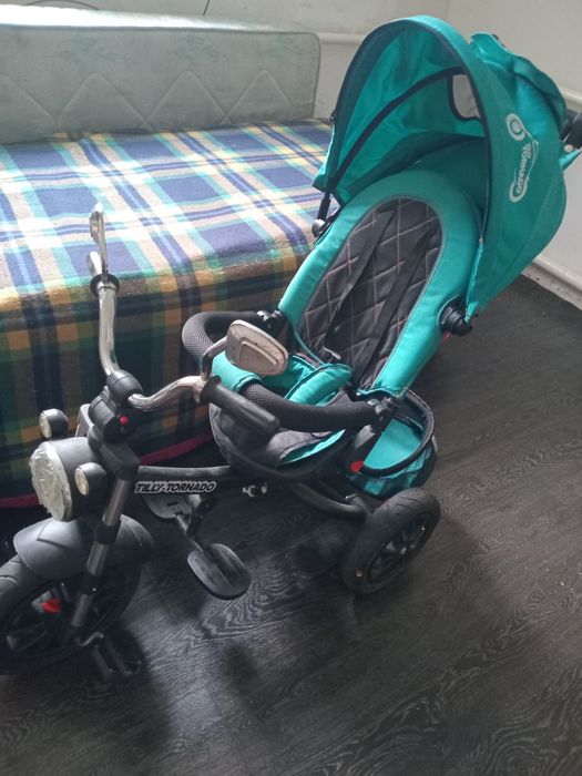 Продам отличный детский трехколесный велосипед-коляску Baby Tilly Tornado в красивом бирюзовом цвете.
