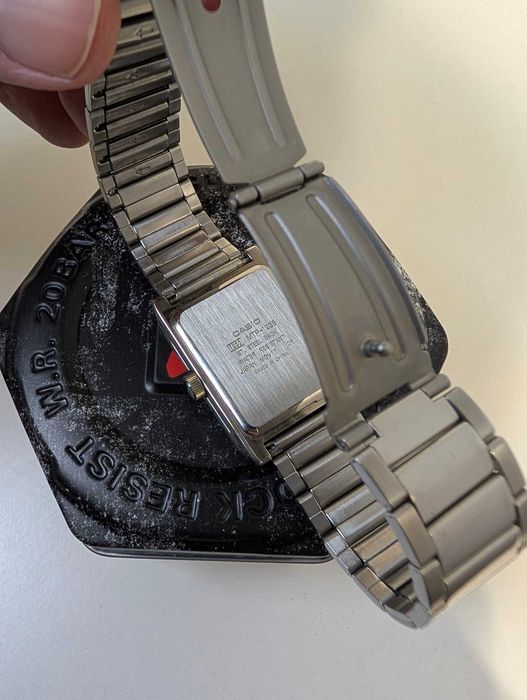Часы Casio MTP-1235, чёрный циферблат, металлический браслет