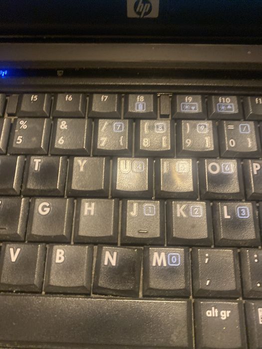 Computador antigo windos 7 tecla N desencaixada,bateria viciada