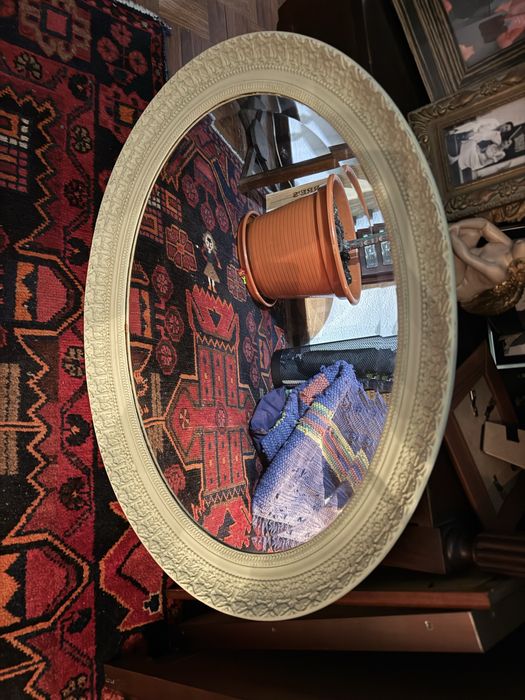 Espelho de oarede oval