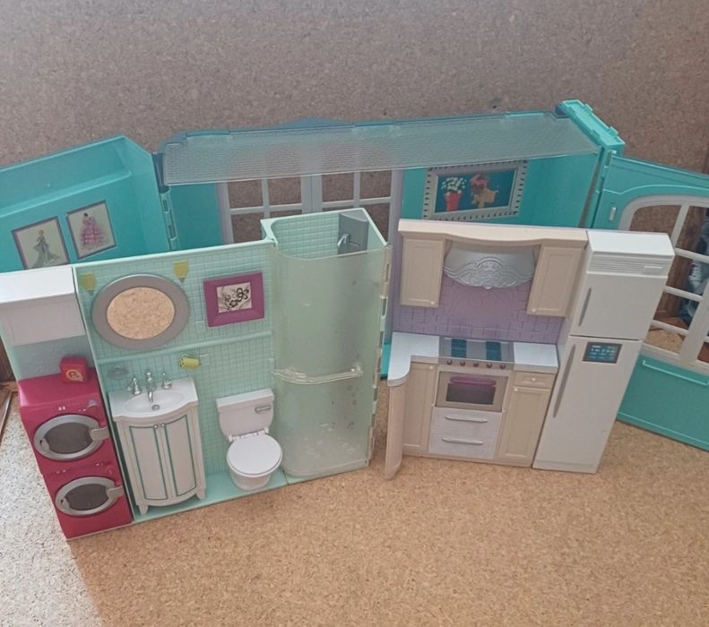 Barbie casa dobrável. 
Mattel.
Anos 2007.