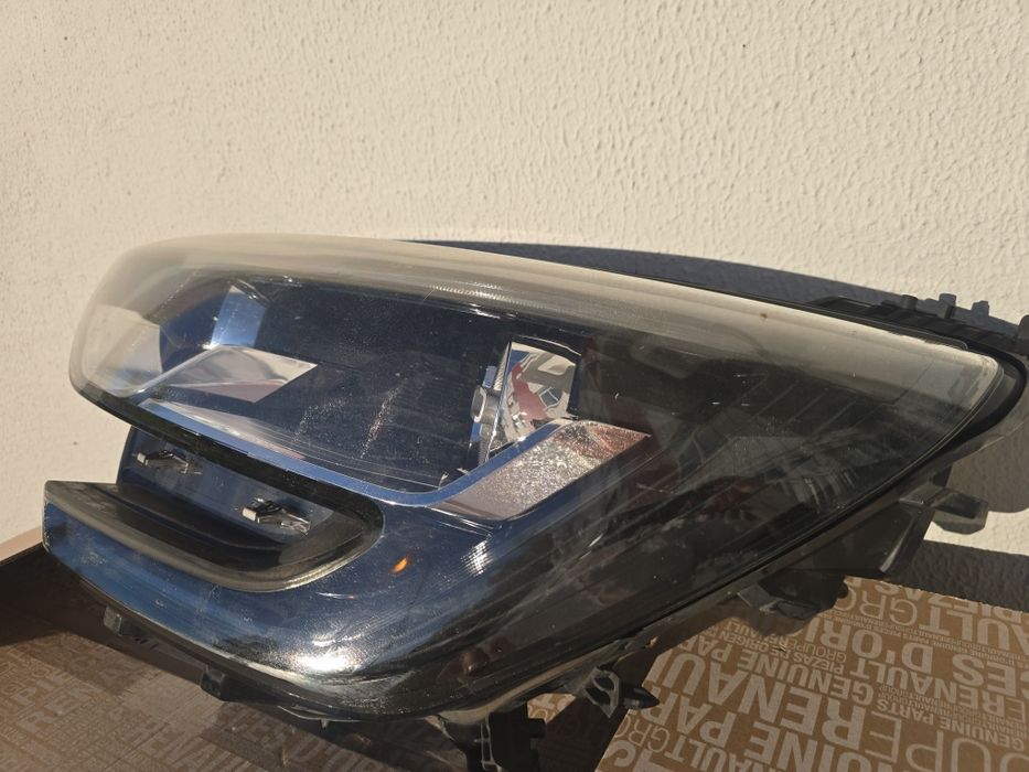 Farol esquerdo Renault Megane