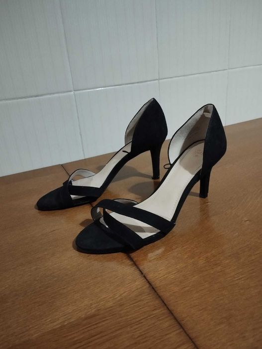 Botas e Sandálias de salto alto