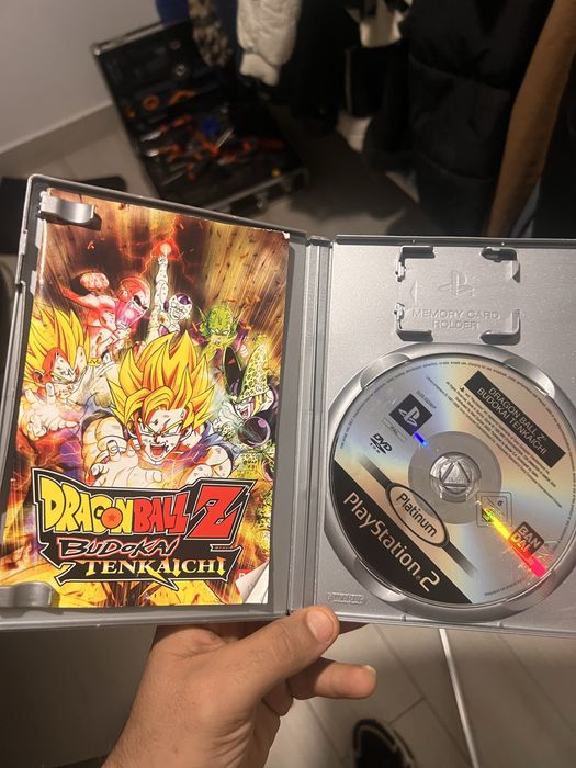 Ps2 com dois jogos e comando