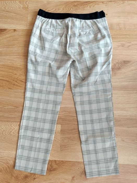 Spodnie w kratkę Zara
